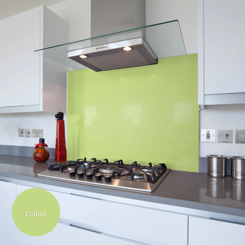 Kiwi green glass splashback behind hob