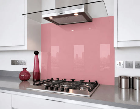 Rosy keepsake pink glass splashback behind hob