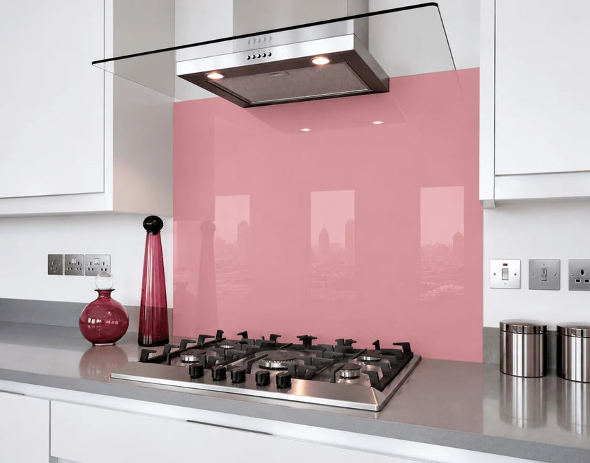 Rosy keepsake pink glass splashback behind hob