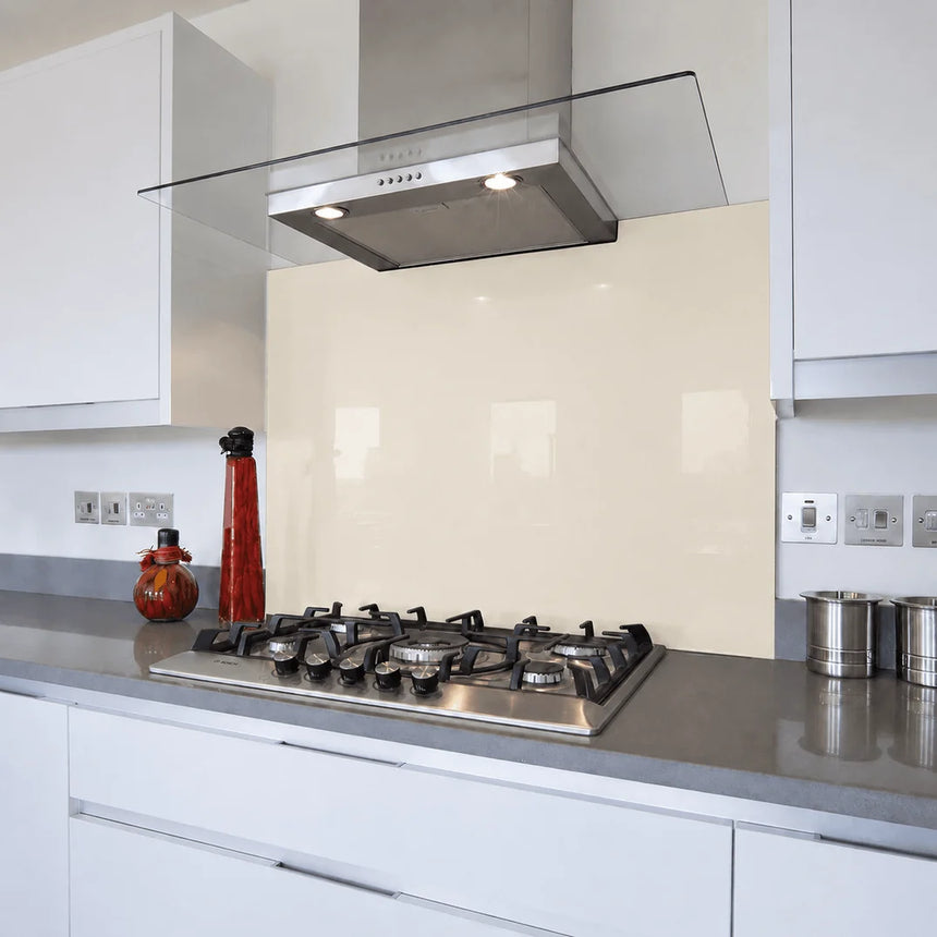 Limewash glass splashback behind hob